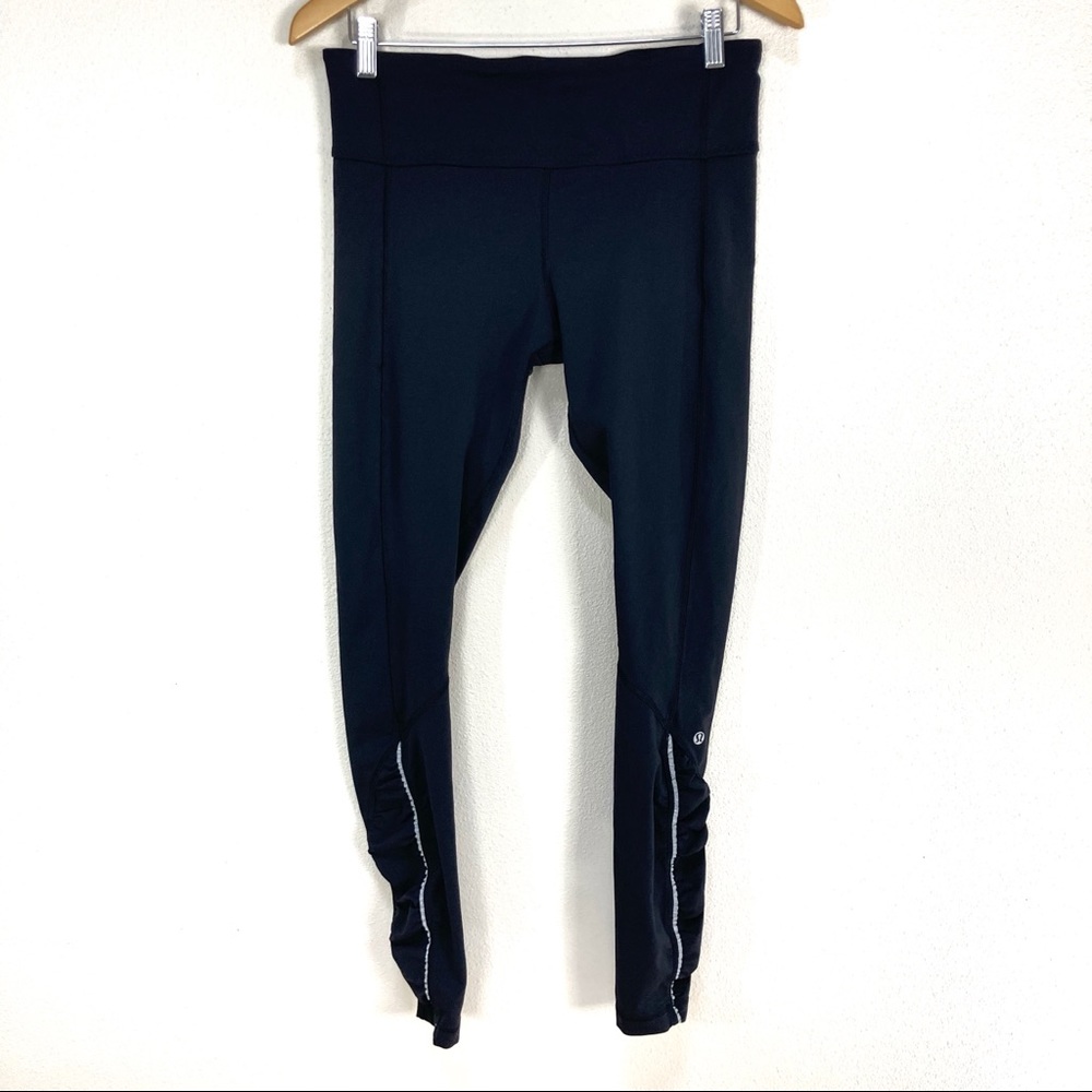 LULULEMON Full Tilt Tight Black High Rise Reflective‎ Hem Leggings Women’s Sz 10